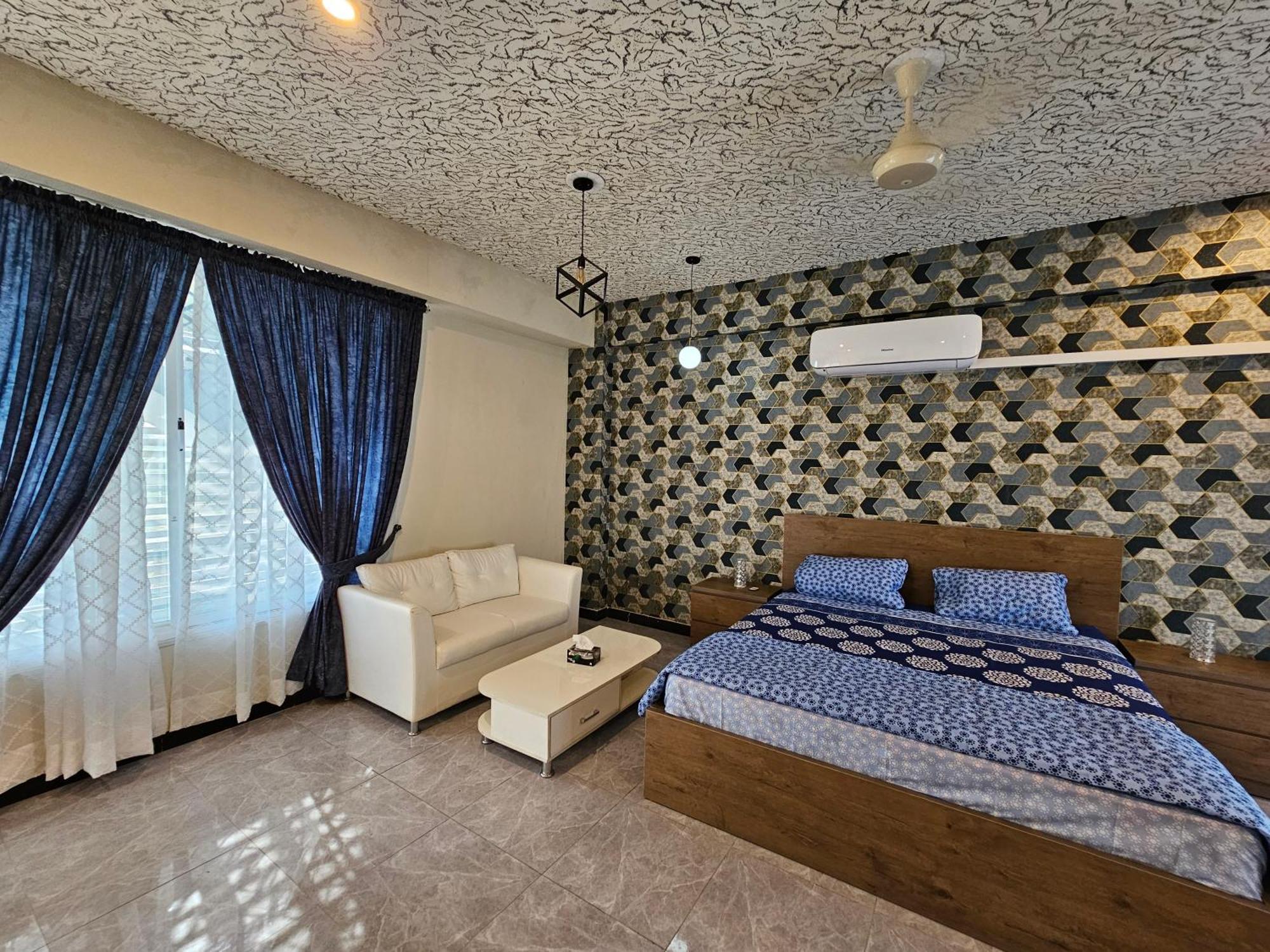 Motorway Majesty Suites Islamabad - Near Islamabad International Airport And Motorway Quarto foto